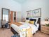 Large bedroom with cozy carpeting