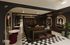 Chic apartment lounge with elegant seating, stylish artwork, and modern lighting, perfect for relaxation and socializing.
