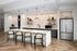 Elegant kitchen with a modern island, stylish pendant lighting, and sleek stainless steel appliances, perfect for gourmet cooking and entertaining.