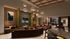 Luxurious modern living area with elegant pendant lighting, plush seating, and a stylish entertainment space.