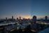 Breathtaking urban sunset view highlighting a vibrant city skyline, perfect for city living enthusiasts.