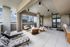 Elegant rooftop lounge with contemporary furniture and panoramic views, perfect for entertaining and relaxation.