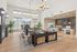 Elegant lobby area at Rovena at Mt. Zion featuring modern decor, high ceilings, and spacious seating with natural light.