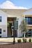Charming apartment building at The View at Crow Creek, featuring modern architectural design and welcoming entrance in Calabash, NC.
