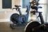 Modern fitness center featuring sleek exercise bikes with advanced connectivity options, set in a well-lit and stylish space.