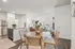 Bright and modern apartment with open-concept living and dining area, featuring stylish furniture and natural light.