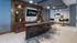 Modern communal space at The Uptown at St. Johns featuring sleek bar seating, elegant countertops, and contemporary decor.