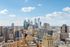 Breathtaking cityscape of Philadelphia featuring iconic skyscrapers under a clear blue sky.