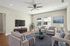 This spacious living room offers plenty of room for relaxation and entertaining with flexible layout options. | Legacy at Crowley |