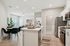 The updated kitchen features fresh finishes, quality appliances, and improved functionality for daily cooking needs. | Legacy at Crowley | Atlanta Apartments