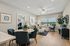 Bright and welcoming living room with elegant decor, plush seating, and large window providing ample natural light. | Legacy at Crowley | Atlanta Apartments