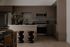 Elegant kitchen design with modern fixtures, subtle wood cabinetry, and a stylish dining area. Perfect for culinary creativity and social gatherings.