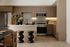 Modern kitchen with sleek wooden cabinets, stainless steel appliances, stylish bar stools, and elegant decor.
