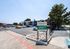 Modern UniversityView Denton apartment complex with spacious parking and vibrant leasing office signage.