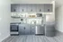 Modern kitchen with sleek gray cabinetry, stainless steel appliances, and stylish open shelving.