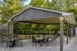 Charming outdoor pavilion with stylish seating area, surrounded by lush greenery, ideal for social gatherings.
