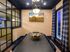 Sophisticated Meeting Room featuring a 65" TV for Presentations