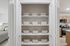 Spacious pantry with built-in shelving
