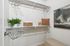 Spacious walk-in closet with built-in shelving