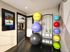 Vibrant fitness room with colorful exercise balls and equipment, inviting and energetic space for workouts.