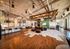 Modern and spacious lounge area with stylish seating, vibrant lighting, perfect for social gatherings.