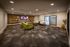 Elegant entertainment room featuring a large TV for relaxation.