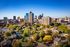 Breathtaking aerial view of a flourishing city skyline, showcasing modern skyscrapers.