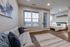 Inviting modern apartment with cozy living room, plush sofa, chic bedroom, and elegant wood flooring, perfect for urban living.