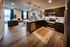 Modern one bedroom apartment with open-concept kitchen, cozy living room, perfect for urban living.