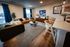 Modern one bedroom living room and a chic open dining area.