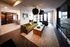 Modern clubhouse with a sleek open-concept design, perfect for relaxation.