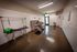 Modern pet grooming area featuring a sleek washing station including a professional-grade dryer.