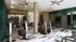 Modern fitness center at The Vault on Main with state-of-the-art equipment, sleek design, and vibrant green accents perfect for an energetic workout.