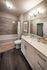 Flats at Walnut Ridge Apartments -Elegant bathroom interior with a modern bathtub, stylish vanity with ample storage, and sophisticated lighting accents.