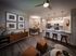 Flats at Walnut Ridge Apartments -Inviting modern apartment interior featuring a sleek open-plan kitchen with pendant lighting and comfortable living area, perfect for entertaining.