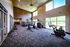 Flats at Walnut Ridge Apartments - Spacious, well-lit gym with state-of-the-art cardio machines and scenic outdoor views.
