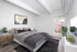 Cheesman Park, CO, apartments near Congress Park - The Grove on York - Bright Bedroom With Upholstered Bed, Exposed Ceiling Beams, Large Window, Nightstands, Area Rug, and Neutral Decor.