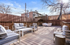 Inviting outdoor deck with stylish seating, perfect for relaxation or entertaining on sunny days.