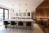 Sleek and modern kitchen and dining area with elegant seating, contemporary lighting, and stylish wood accents.