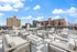 Chic rooftop lounge with modern outdoor seating and stunning city views, perfect for relaxation and entertainment.