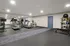 Modern fitness center featuring state-of-the-art treadmills, exercise bikes, and vibrant workout accessories for an energetic lifestyle.