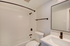 Modern bathroom with elegant fixtures, a sleek vanity, and a bright, inviting atmosphere.