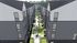 Modern apartment complex with spacious pathways flanked by lush greenery and stylish architecture.
