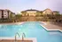 Swimming pool with in water seating at Abberly Place Apartments in Garner, NC