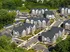 An aerial view of modern apartment buildings at Abberly Liberty Crossing Apartments in Charlotte, NC