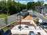 An aerial view of the dog park with seating at Abberly Liberty Crossing Apartments in Charlotte, NC