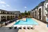 Resort Style Swimming Pool with lounge chairs at Abberly Liberty Crossing Apartments in Charlotte, NC