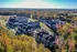 An aerial view of modern apartment buildings at Abberly Liberty Crossing Apartments in Charlotte, NC