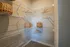 A spacious walk-in closet featuring wire shelving at Abberly Liberty Crossing Apartments in Charlotte, NC