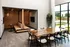 Clubhouse featuring a conference table with private sitting areas at Abberly Liberty Crossing Apartments in Charlotte, NC